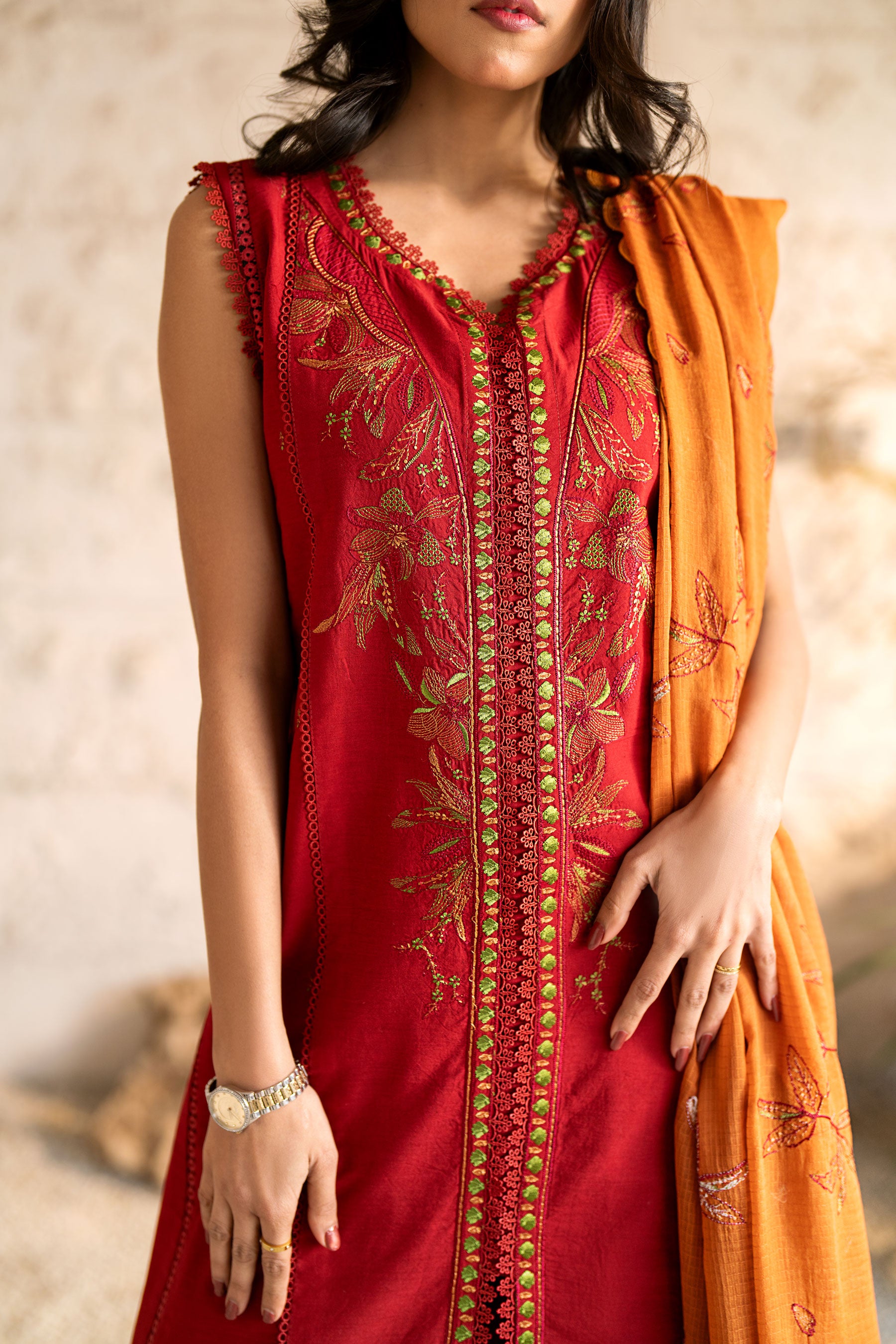 Crimson Dust 3 Piece Embroidered Lawn Stitched Suit.Order now